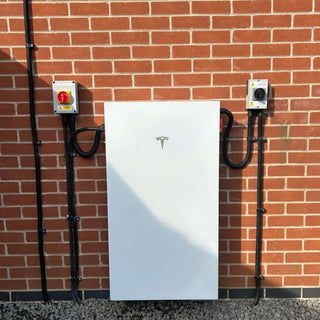 Tesla Powerwall 3 installed on outdoor wall showing connections