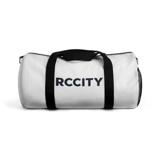 White duffel bag with black straps and 'RCCITY' 