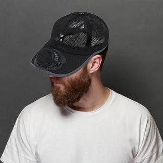Man wearing a black cap with a shark mouth design - RC city