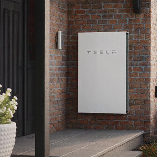 Tesla Powerwall 2 13.5 kWh installed on a brick wall video zooming in